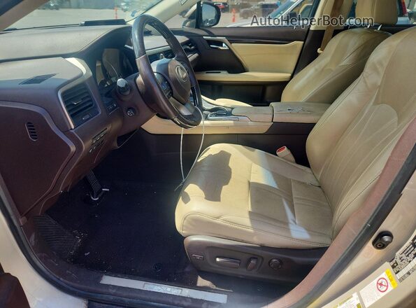 2T2ZZMCA3HC044595 2017 LEXUS RX Gold Front interior view