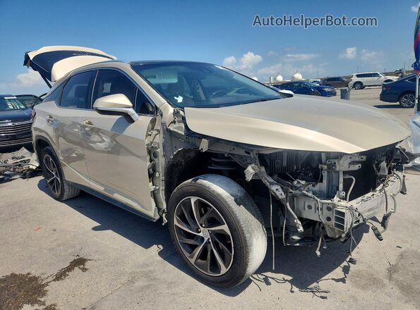 2T2ZZMCA3HC044595 2017 LEXUS RX Gold Front right