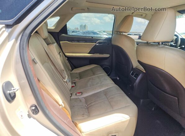 2T2ZZMCA3HC044595 2017 LEXUS RX Gold Rear interior view