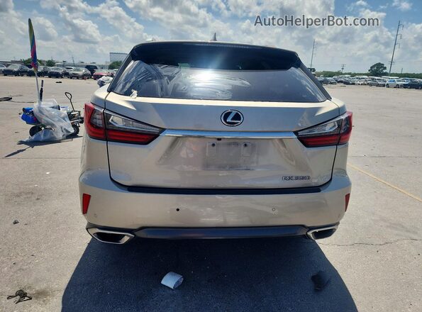 2T2ZZMCA3HC044595 2017 LEXUS RX Gold Rear view