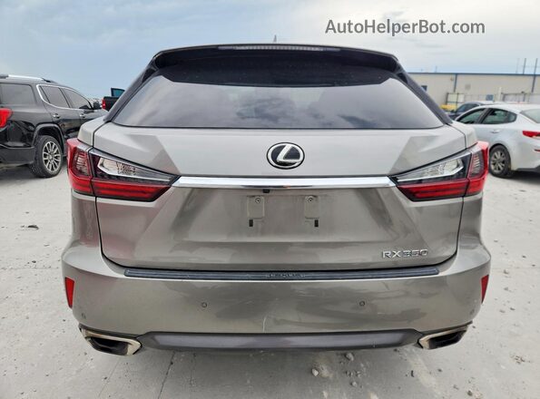 2T2ZZMCA3HC080948 2017 LEXUS RX Silver Rear view