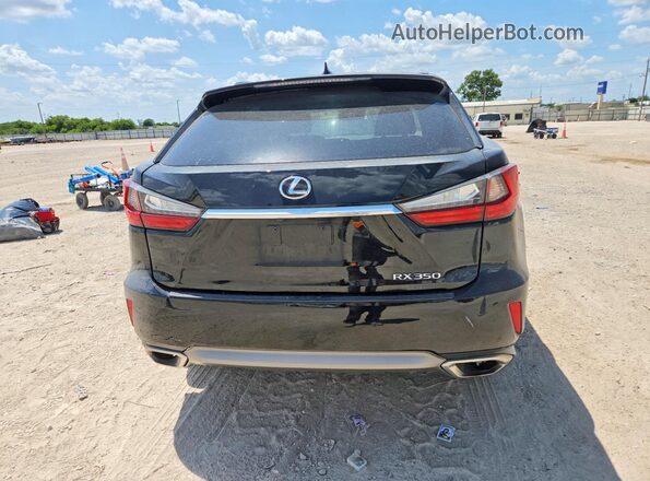 2T2ZZMCA7GC029581 2016 LEXUS RX Black Вид ззаду