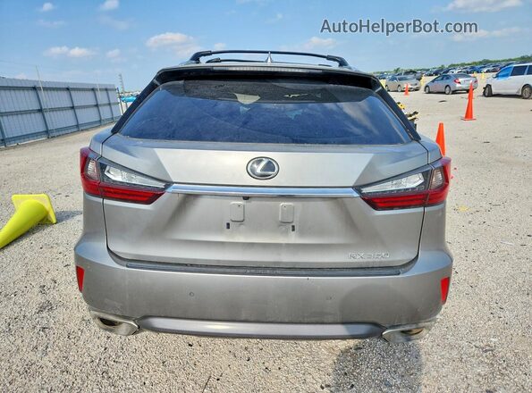2T2ZZMCA9HC038803 2017 LEXUS RX Gray Widok z tyłu