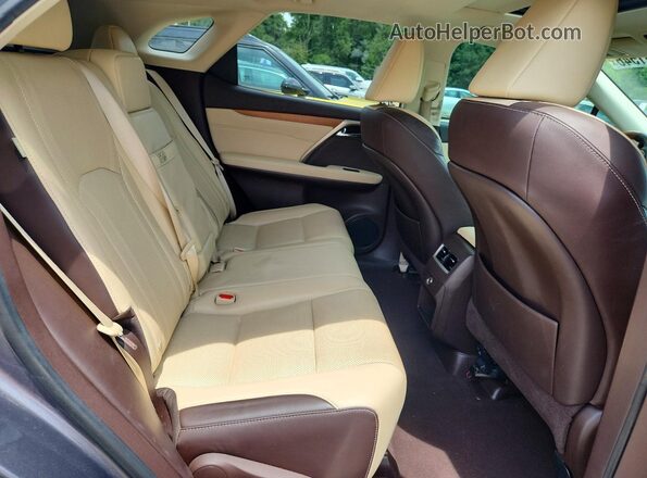 2T2ZZMCAXGC010944 2016 LEXUS RX Серый Вид задней части салона