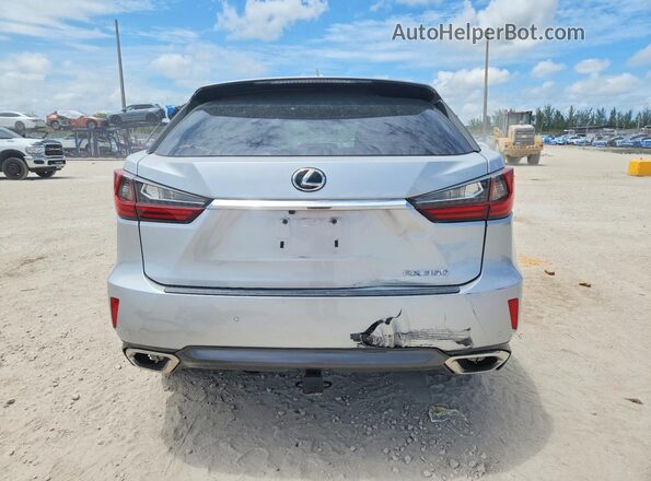 2T2ZZMCAXJC109237 2018 LEXUS RX Silver Вид ззаду