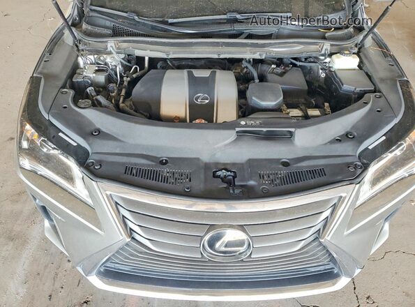 2T2ZZMCAXJC116852 2018 LEXUS RX Gray Vista interior trasera