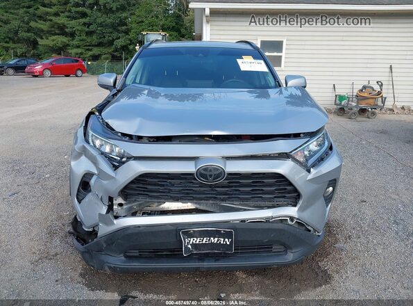 2T3A1RFV4KW070317 2019 TOYOTA RAV4 Silver Вид задньої частини салону