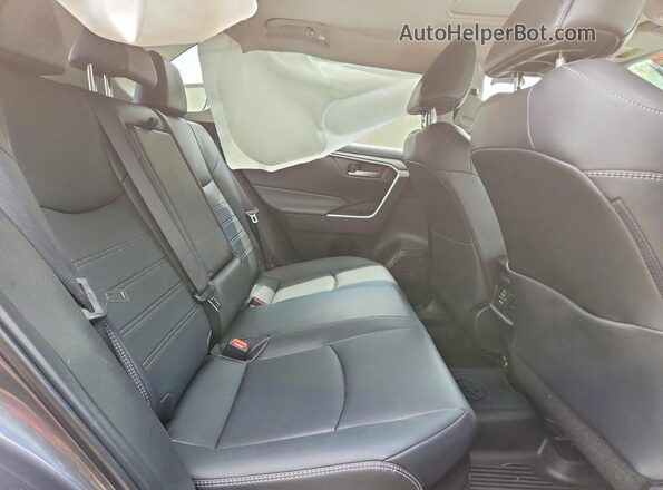 2T3B6RFV0SW089677 2025 TOYOTA RAV4 Charcoal Вид задньої частини салону