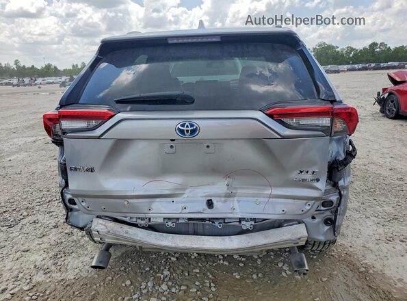2T3B6RFV3MW020386 2021 TOYOTA RAV4 Silver Rear view