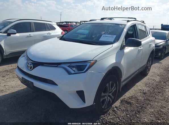 2T3BFREV0GW416670 2016 TOYOTA RAV4 White Vista tres cuartos delantera izquierda