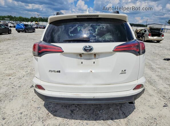 2T3BFREV0JW748941 2018 TOYOTA RAV4 White Rear view
