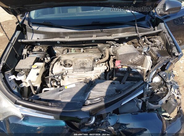2T3BFREV0JW757168 2018 TOYOTA RAV4 Blue Rear view