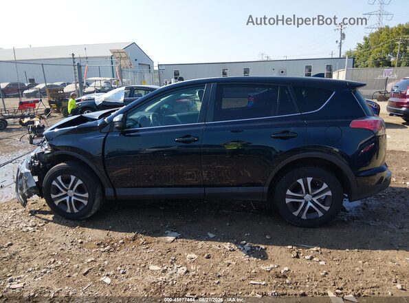 2T3BFREV0JW757168 2018 TOYOTA RAV4 Blue Rear interior view