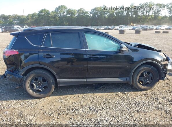 2T3BFREV1HW674553 2017 TOYOTA RAV4 Black Rear interior view