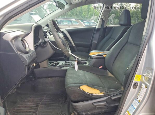 2T3BFREV2GW515071 2016 TOYOTA RAV4 Silver Front interior view