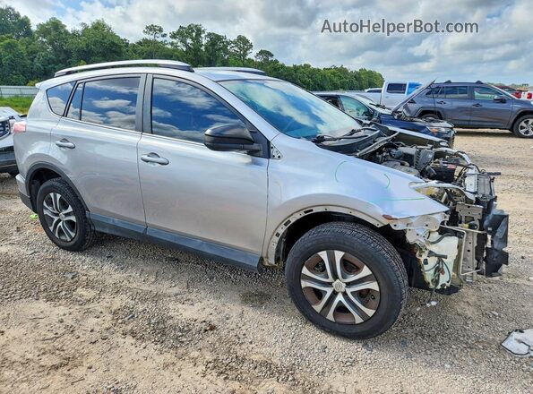 2T3BFREV2GW520450 2016 TOYOTA RAV4 Silver Delantero derecho