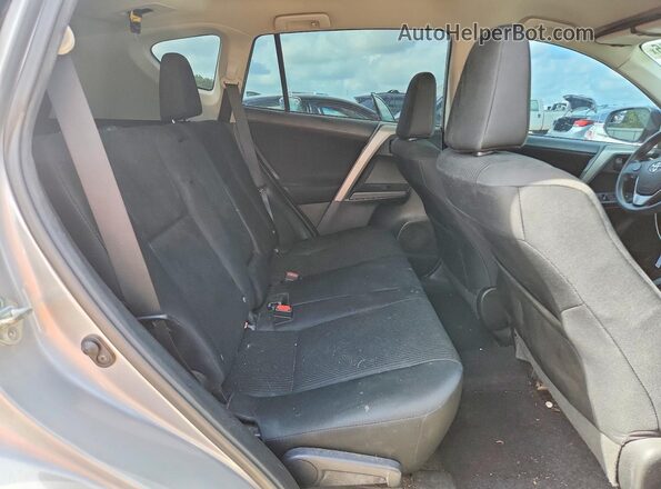 2T3BFREV2GW520450 2016 TOYOTA RAV4 Silver Vista interior trasera