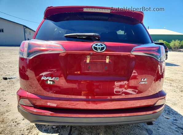 2T3BFREV2JW749914 2018 TOYOTA RAV4 Red Rear view