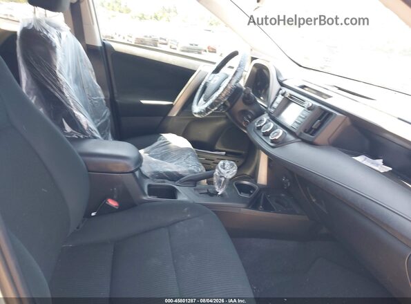 2T3BFREV3GW417988 2016 TOYOTA RAV4 Silver Front interior view