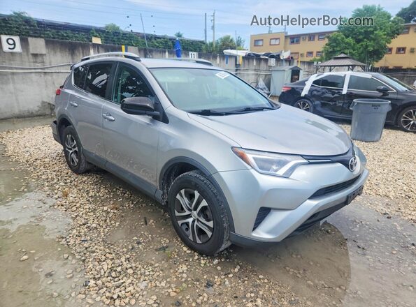 2T3BFREV3GW445077 2016 TOYOTA RAV4 Silver Widok wnętrza z przodu