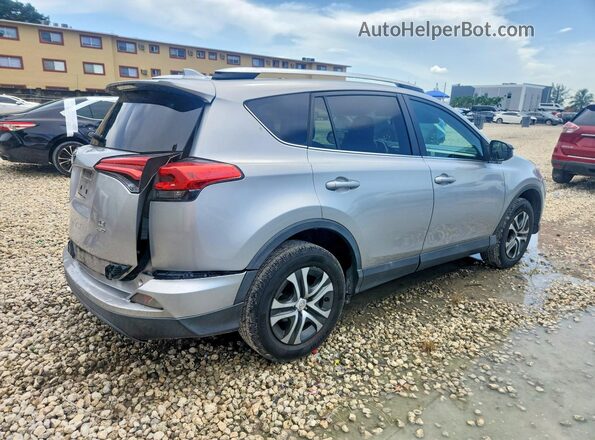 2T3BFREV3GW445077 2016 TOYOTA RAV4 Silver Widok z przodu