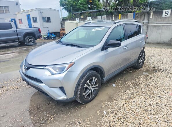 2T3BFREV3GW445077 2016 TOYOTA RAV4 Silver Tył lewy