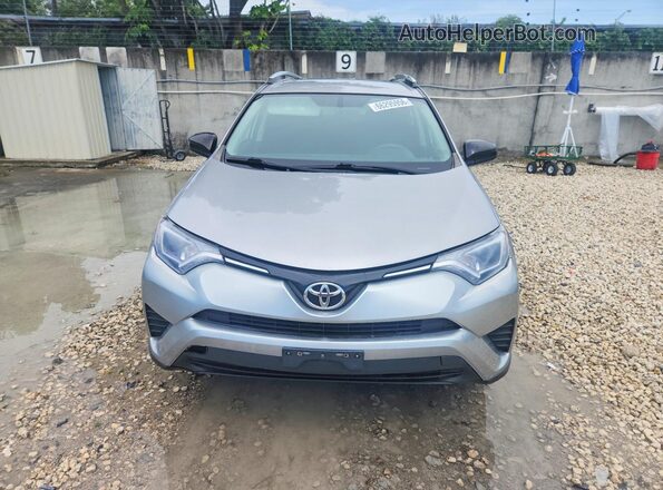 2T3BFREV3GW445077 2016 TOYOTA RAV4 Silver Widok deski rozdzielczej