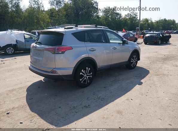2T3BFREV3GW483697 2016 TOYOTA RAV4 Silver Հետևի աջ