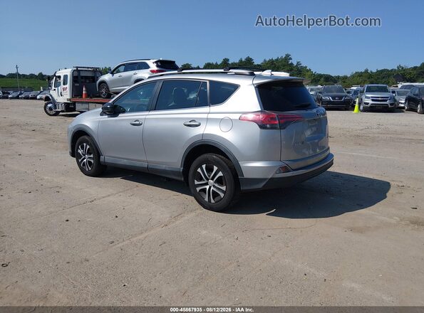 2T3BFREV3GW483697 2016 TOYOTA RAV4 Silver Հետևի ձախ
