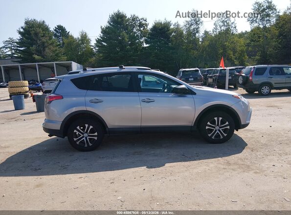 2T3BFREV3GW483697 2016 TOYOTA RAV4 Silver Սալոնի հետևի տեսք