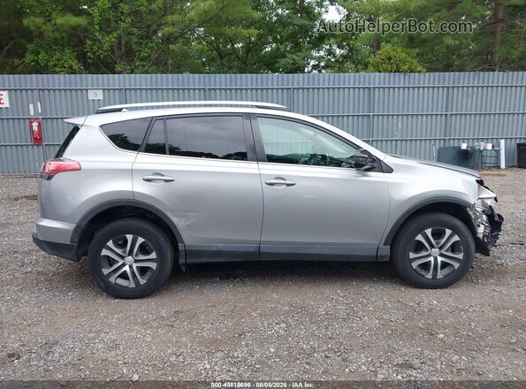 2T3BFREV3GW494926 2016 TOYOTA RAV4 Silver Vista interior trasera