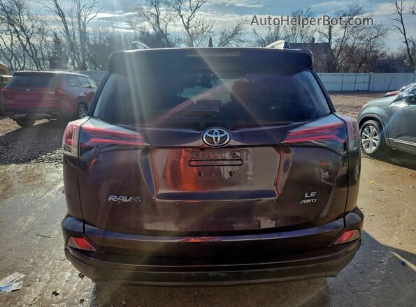 2T3BFREV3JW711818 2018 TOYOTA RAV4 Maroon Rear view