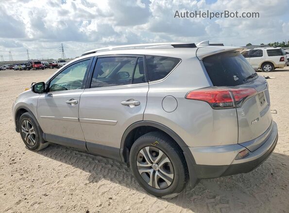 2T3BFREV3JW723953 2018 TOYOTA RAV4 Silver Tył lewy