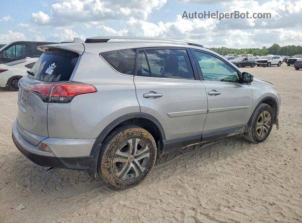 2T3BFREV3JW723953 2018 TOYOTA RAV4 Silver Tył prawy