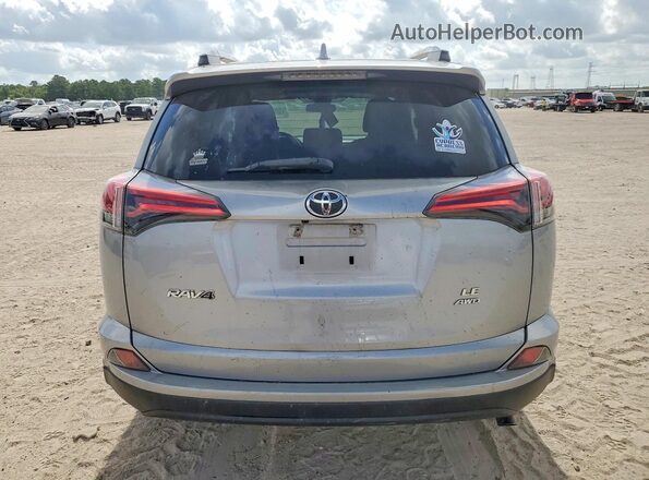 2T3BFREV3JW723953 2018 TOYOTA RAV4 Silver Widok z tyłu