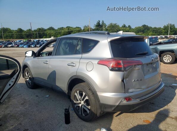 2T3BFREV4JW701752 2018 TOYOTA RAV4 Silver Trasero izquierdo