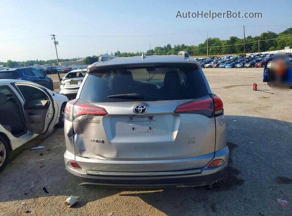 2T3BFREV4JW701752 2018 TOYOTA RAV4 Silver Vista trasera