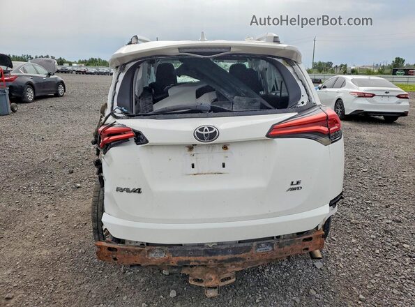 2T3BFREV5GW419211 2016 TOYOTA RAV4 White Rear view