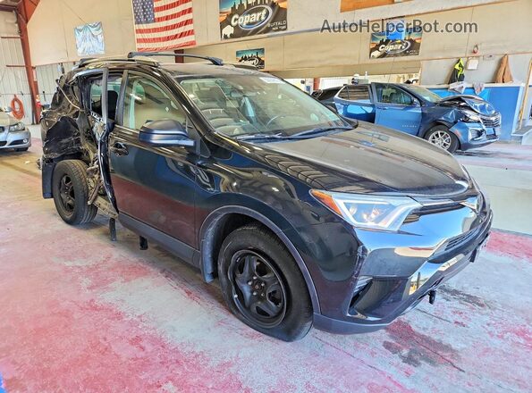 2T3BFREV5JW759675 2018 TOYOTA RAV4 Black Front right