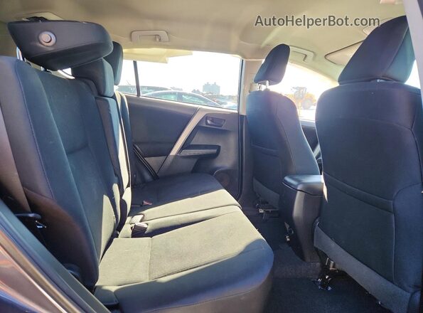 2T3BFREV6GW446191 2016 TOYOTA RAV4 Gray Vista interior trasera