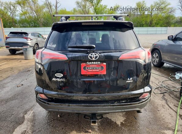 2T3BFREV6GW524758 2016 TOYOTA RAV4 Black Widok z tyłu