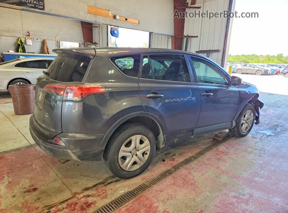 2T3BFREV6JW776565 2018 TOYOTA RAV4 Gray Trasero derecho