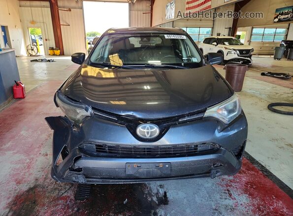 2T3BFREV6JW776565 2018 TOYOTA RAV4 Gray Vista frontal