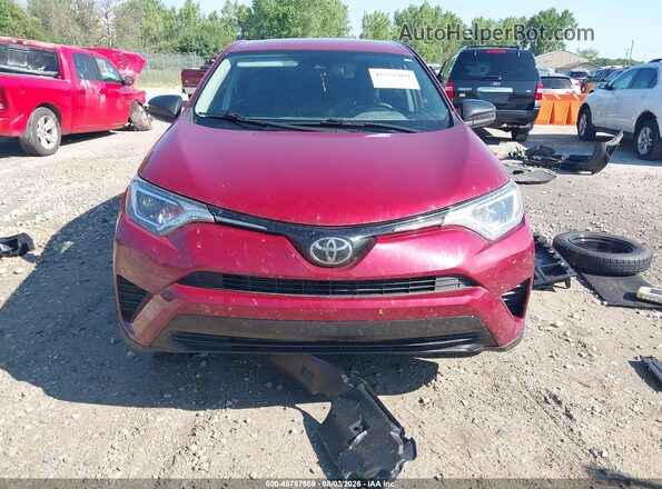 2T3BFREV6JW781202 2018 TOYOTA RAV4 Red Widok wnętrza z tyłu