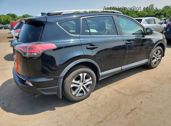 2T3BFREV6JW858151 2018 TOYOTA RAV4 Black Rear right