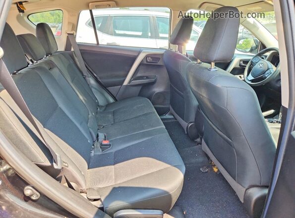 2T3BFREV6JW858151 2018 TOYOTA RAV4 Black Rear seats view