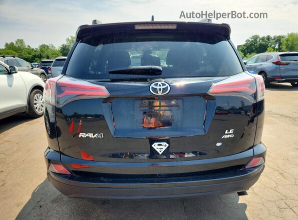 2T3BFREV6JW858151 2018 TOYOTA RAV4 Black Rear view