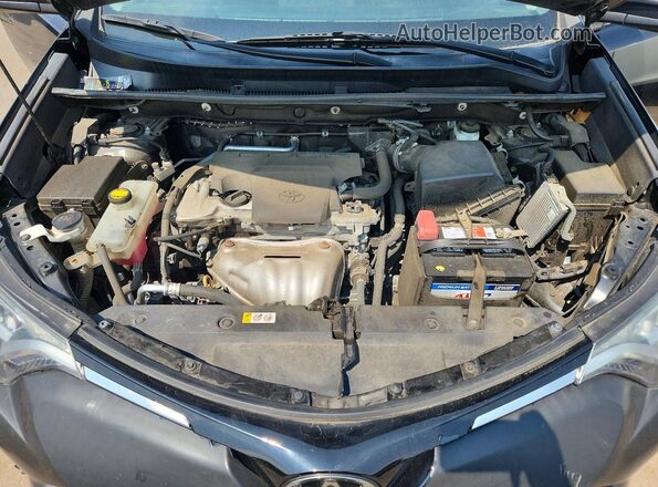 2T3BFREV6JW858151 2018 TOYOTA RAV4 Black Rear interior view
