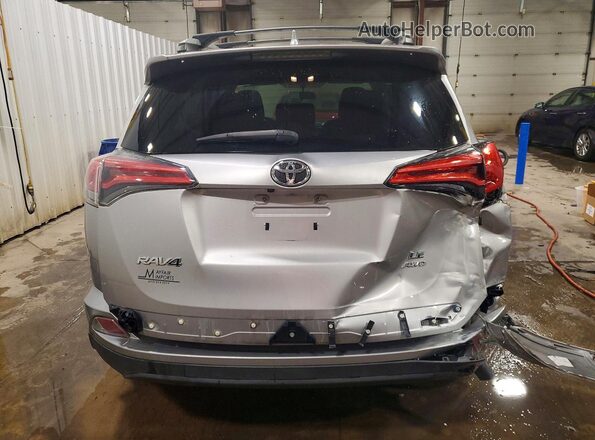 2T3BFREV7GW435779 2016 TOYOTA RAV4 Silver Հետևի տեսք