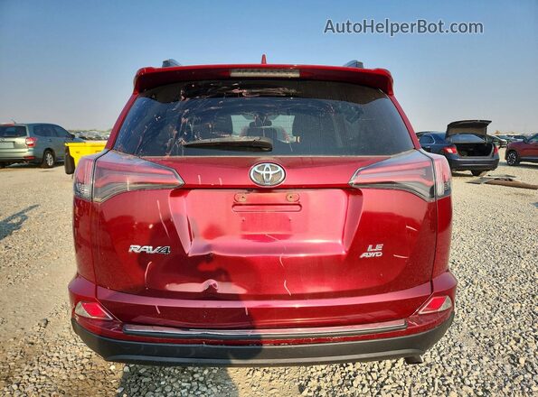 2T3BFREV7JW725950 2018 TOYOTA RAV4 Burgundy Rear view